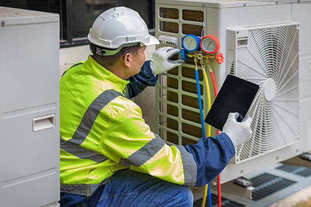 Professional Heat Pump Repair technician working in New Freedom, PA